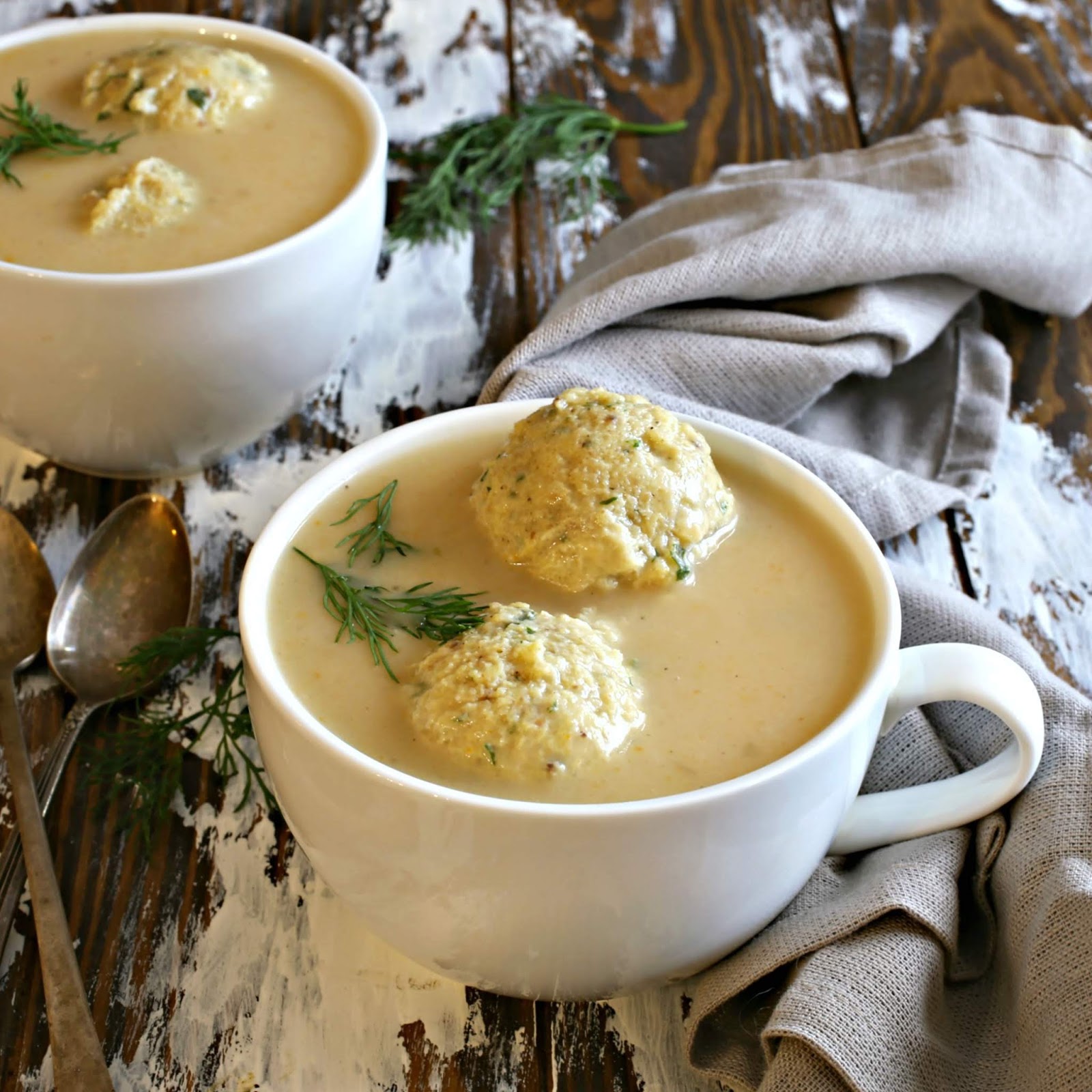 Recipe for easy, creamy chicken soup with herb matzo balls.