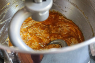 Mixing dough for pumpkin-cranberry-pecan twists