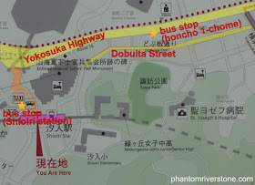 The relative locations of Dobuita Street, the Honcho 1-chome bus stop on the main road, and Shioiri station.