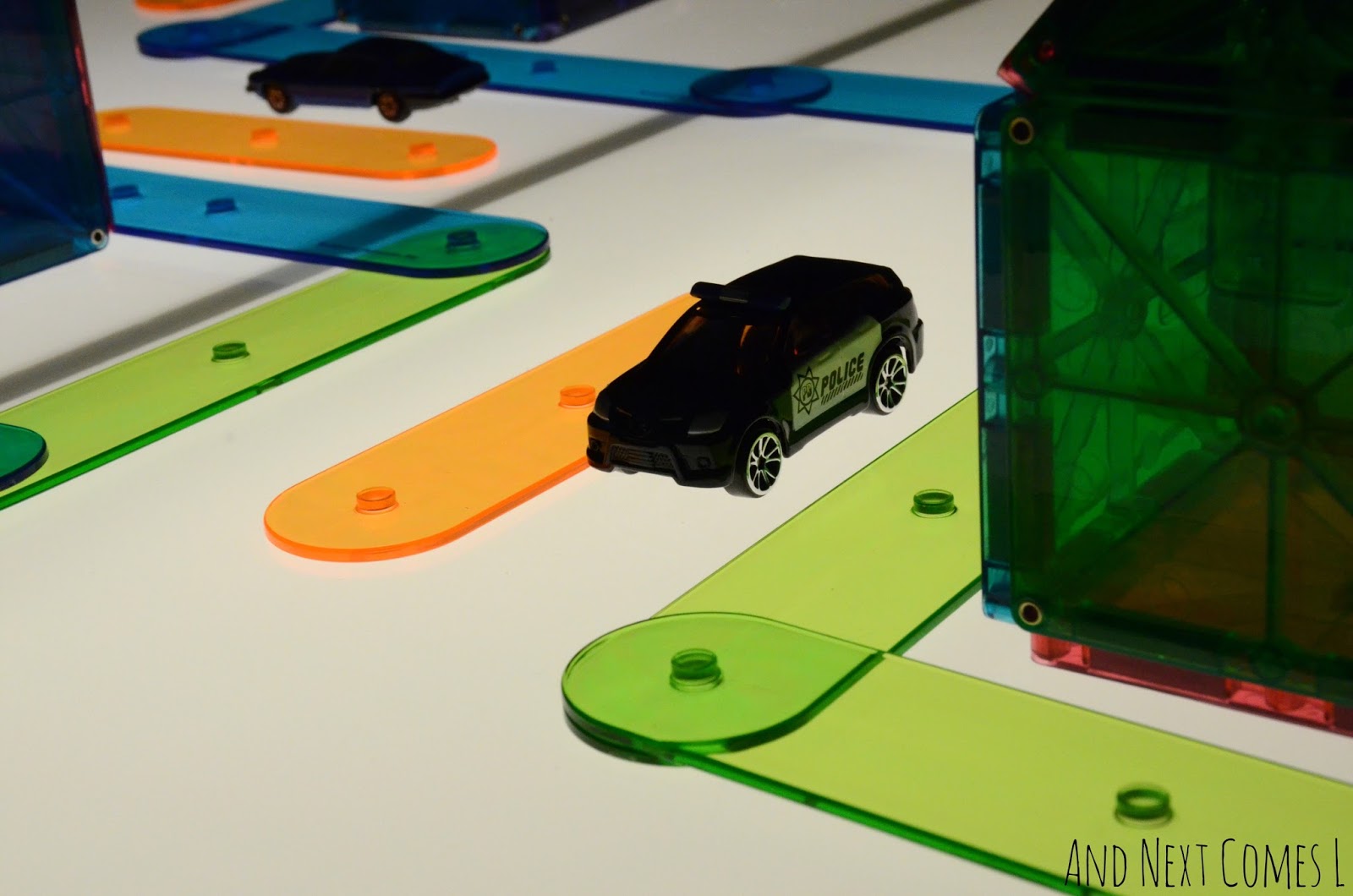 Playing with Cars on the Light Table And Next Comes L Hyperlexia