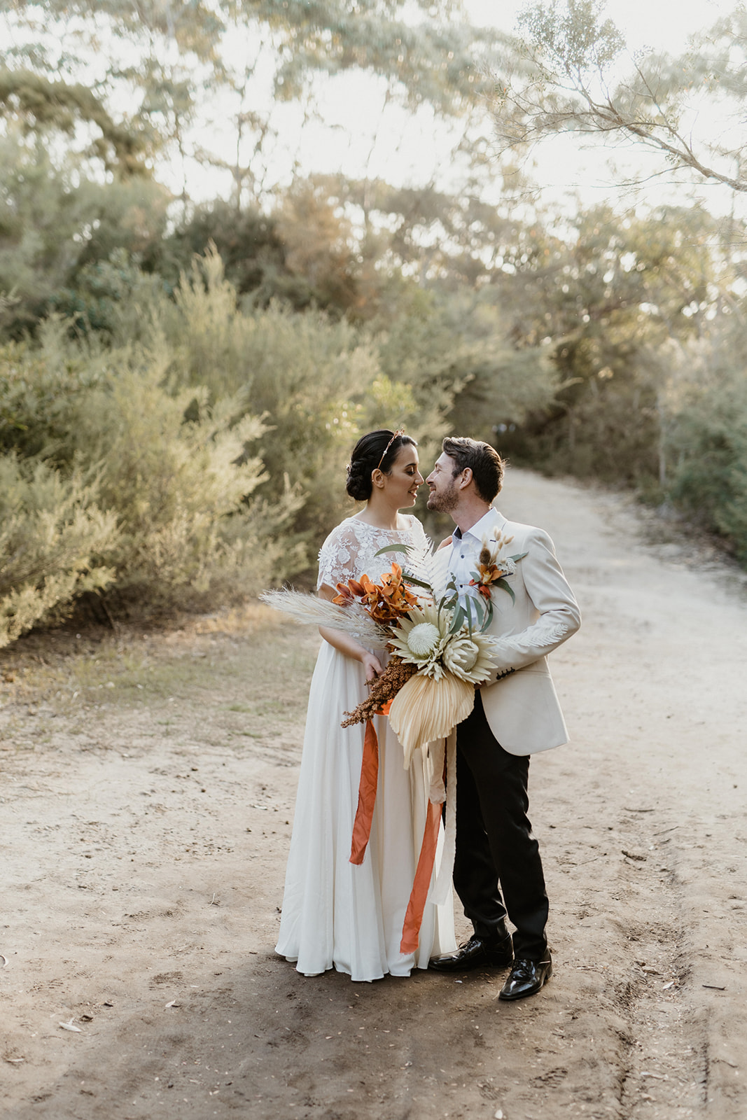 to the aisle australia | terracotta + greenery wedding styling ideas kelly jury photography weddings dried florals bridal gowns stationery style boho weddings
