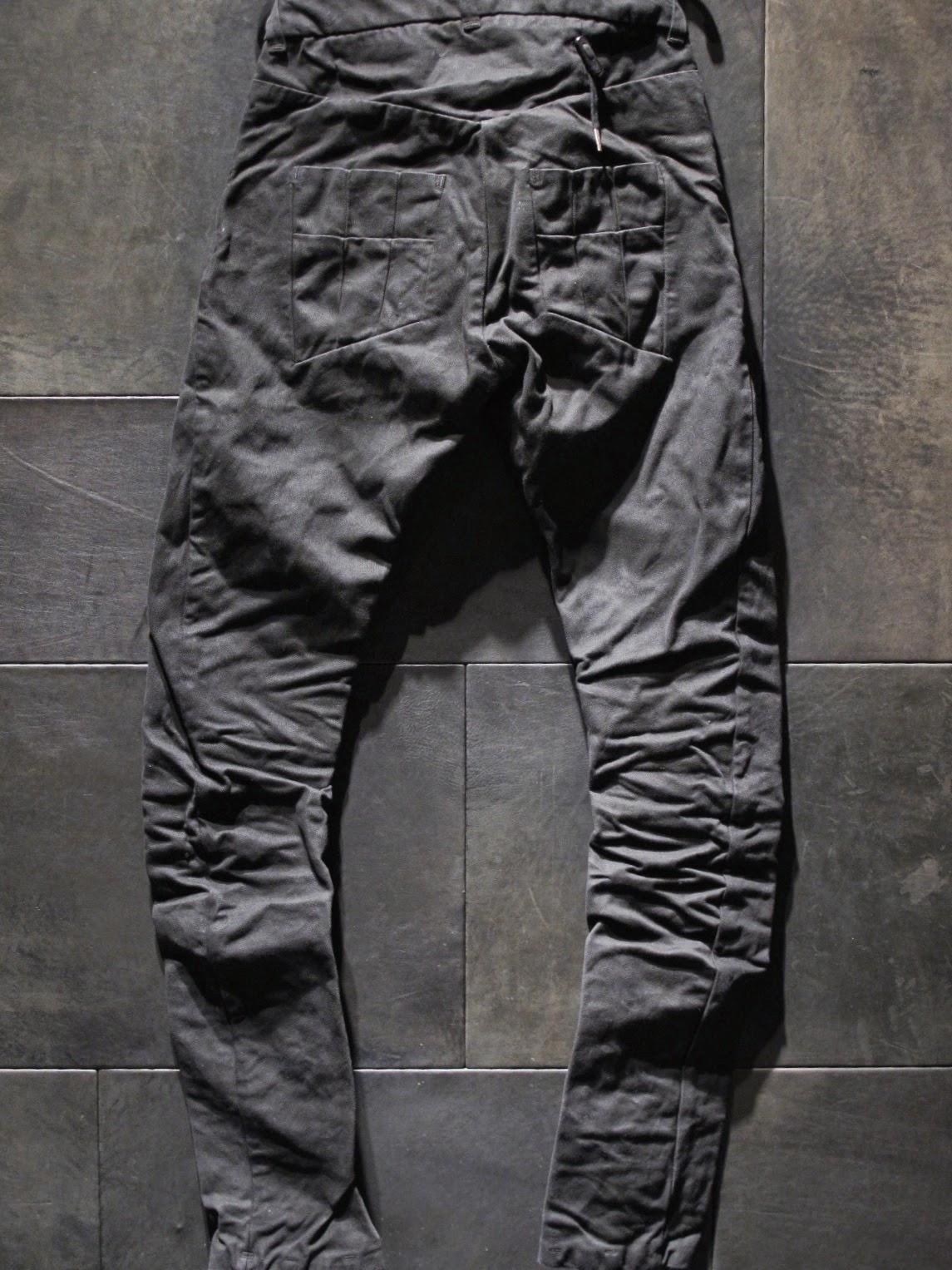 BORIS BIDJAN SABERI FW1415 CURVED PRESSED PANTS