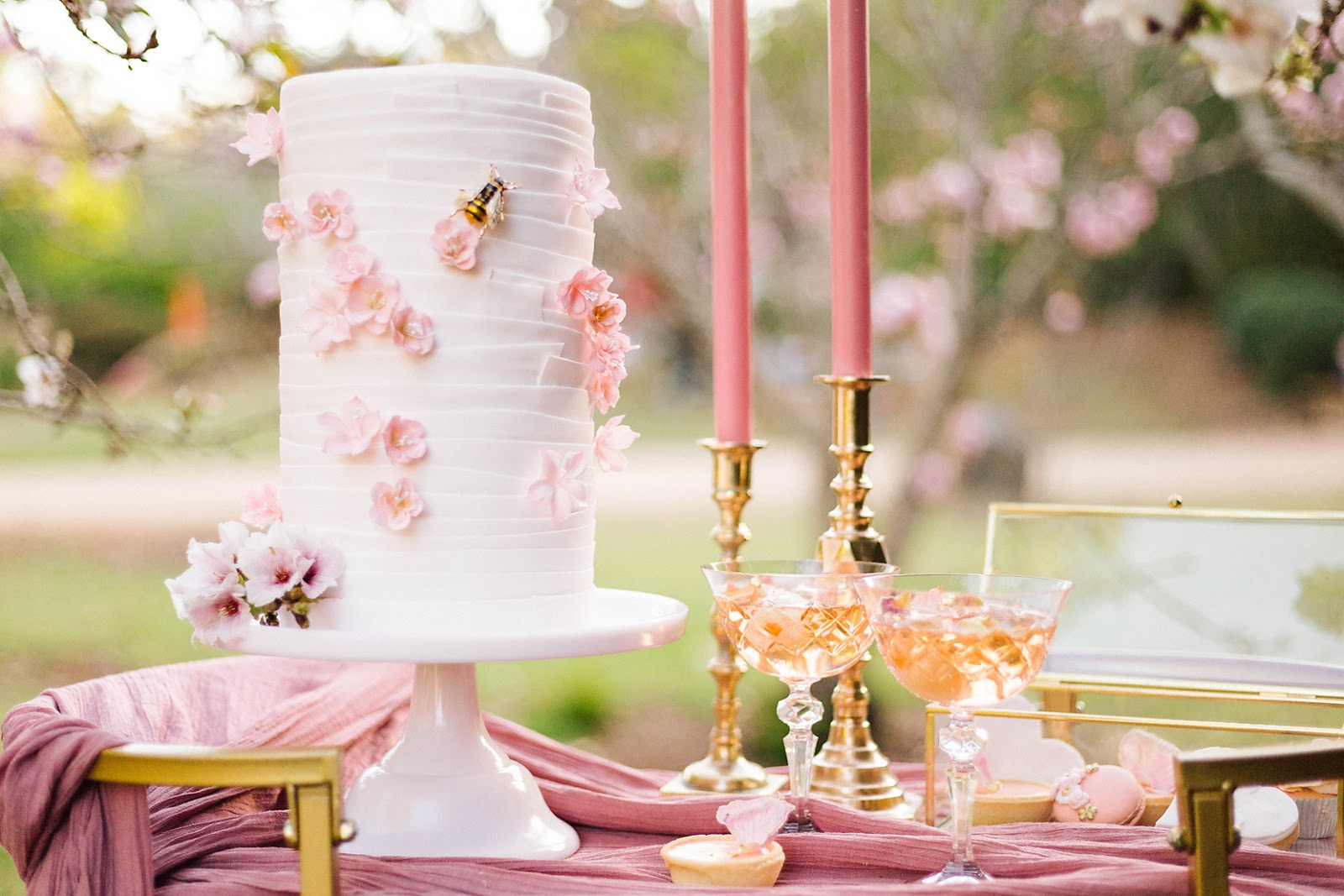 poppy and sage photography weddings cherry blossoms bride groom cake styling