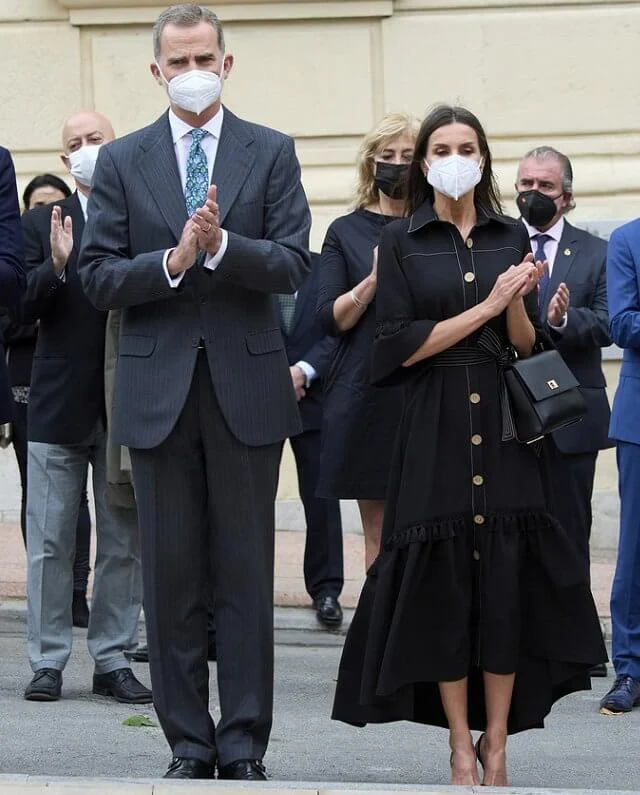 Queen Letizia wore a new black drago denim shirt dress from Leyre Doueil