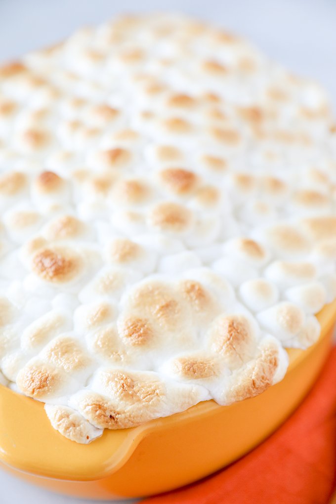 Forget watery and bland sweet potato casseroles, this classic Sweet Potato Casserole recipe is absolutely delicious. Fresh sweet potatoes mashed with butter and heavy cream, mixed with toasted pecans and topped with toasted marshmallows. 