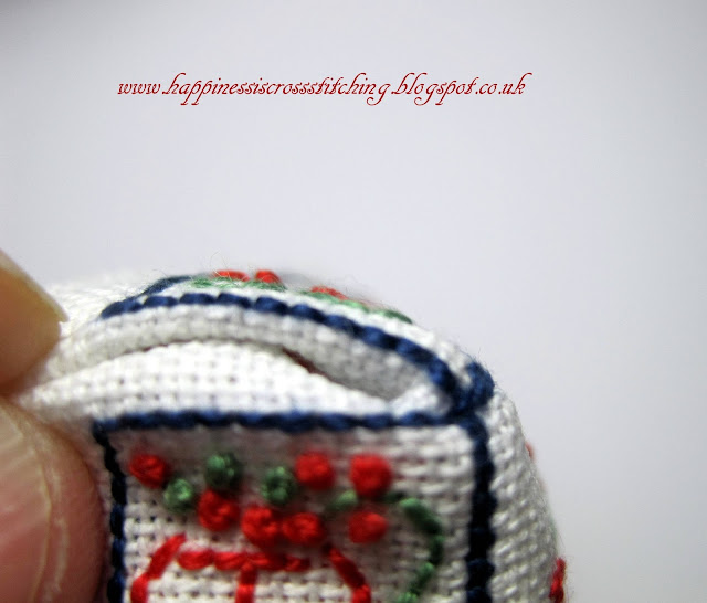 Cross stitched cottage with french knots a tutorial showing how to finish into a mattress pincushion