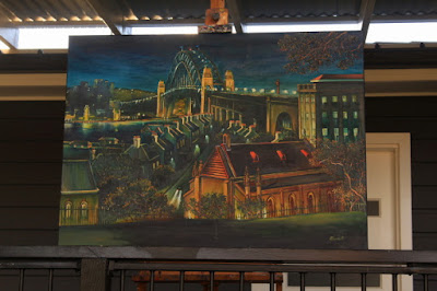 Plein air oil painting of nocturne of the Rocks and Sydney Harbour Bridge from Observatory Hill painted by industrial heritage artist Jane Bennett