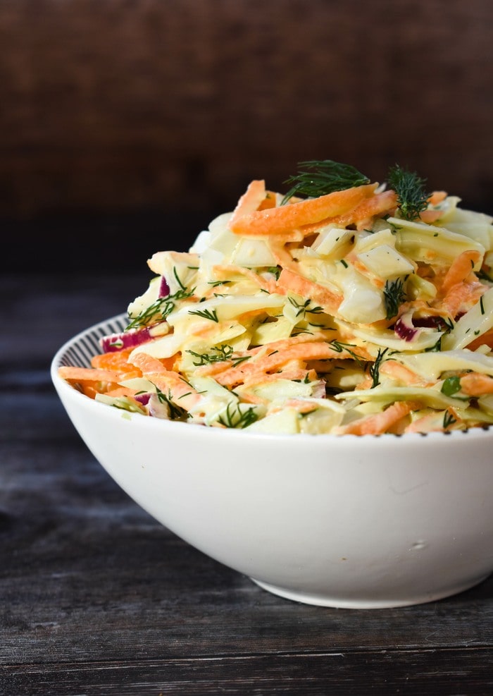 dairy-free carrot coleslaw A bowl of carrot coleslaw