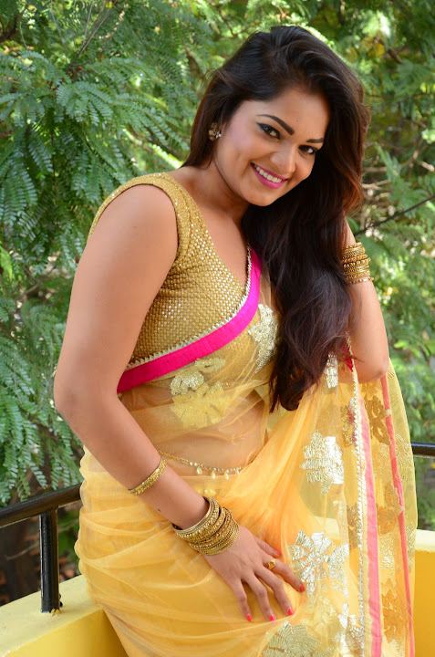 Ashwini Cleavage in Yellow Saree
