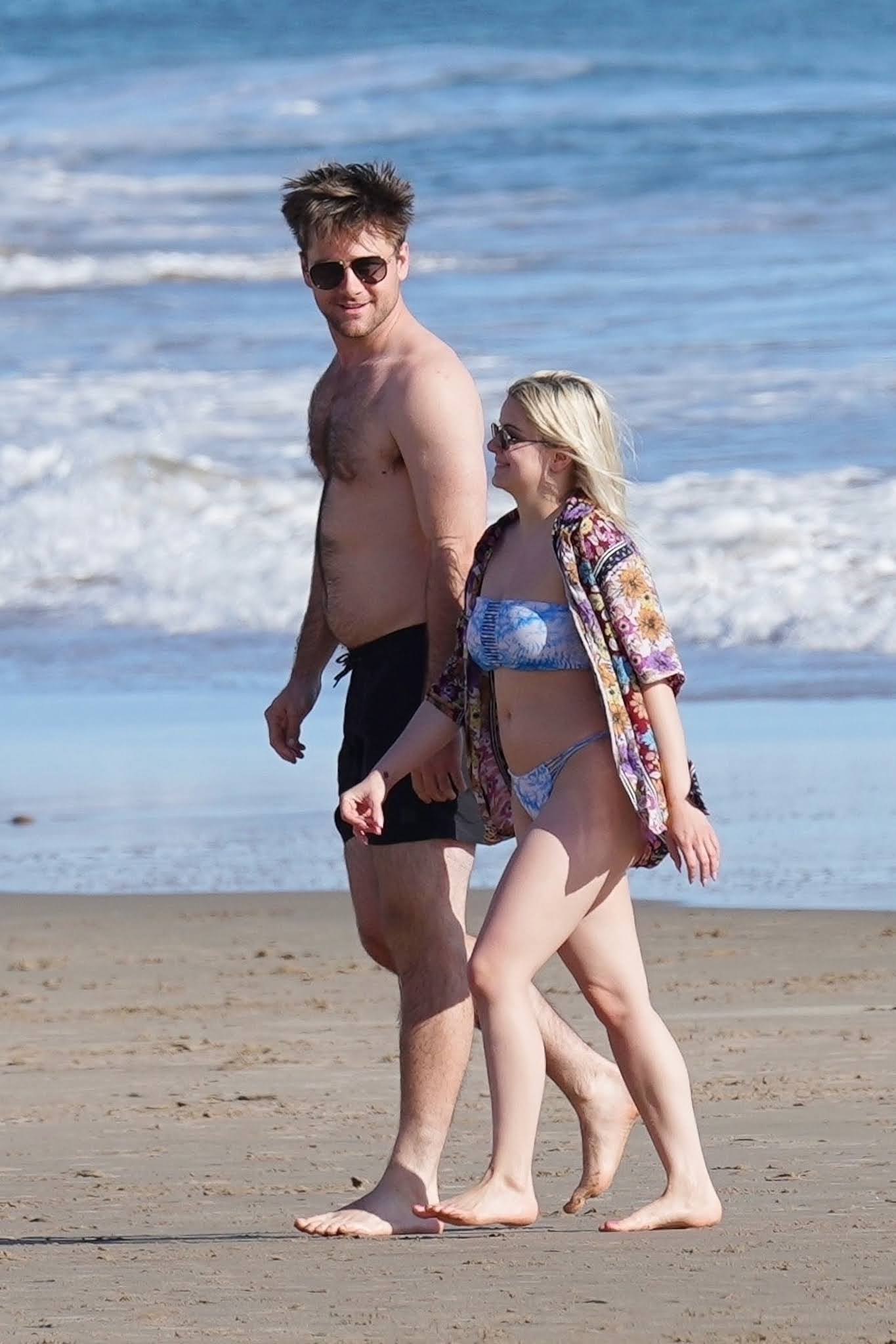 Ariel Winter stuns her bottom in a tie-dye bikini with Luke Benward at Santa Barbara