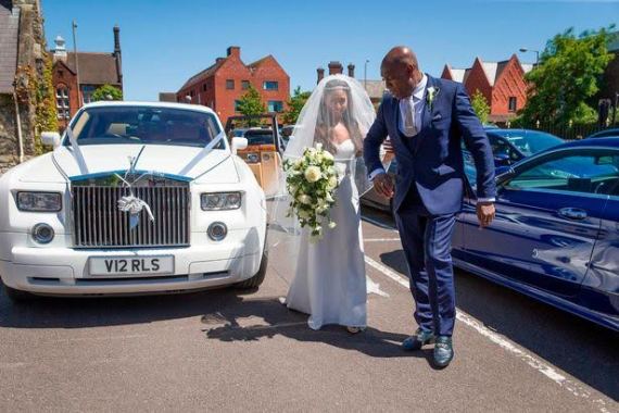 Boxing legend Frank Bruno led his daughter, Rachel, down the aisle as she married her childhood sweetheart (photos)