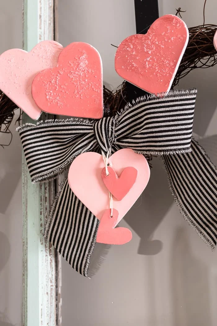 striped bow and hearts on wreath