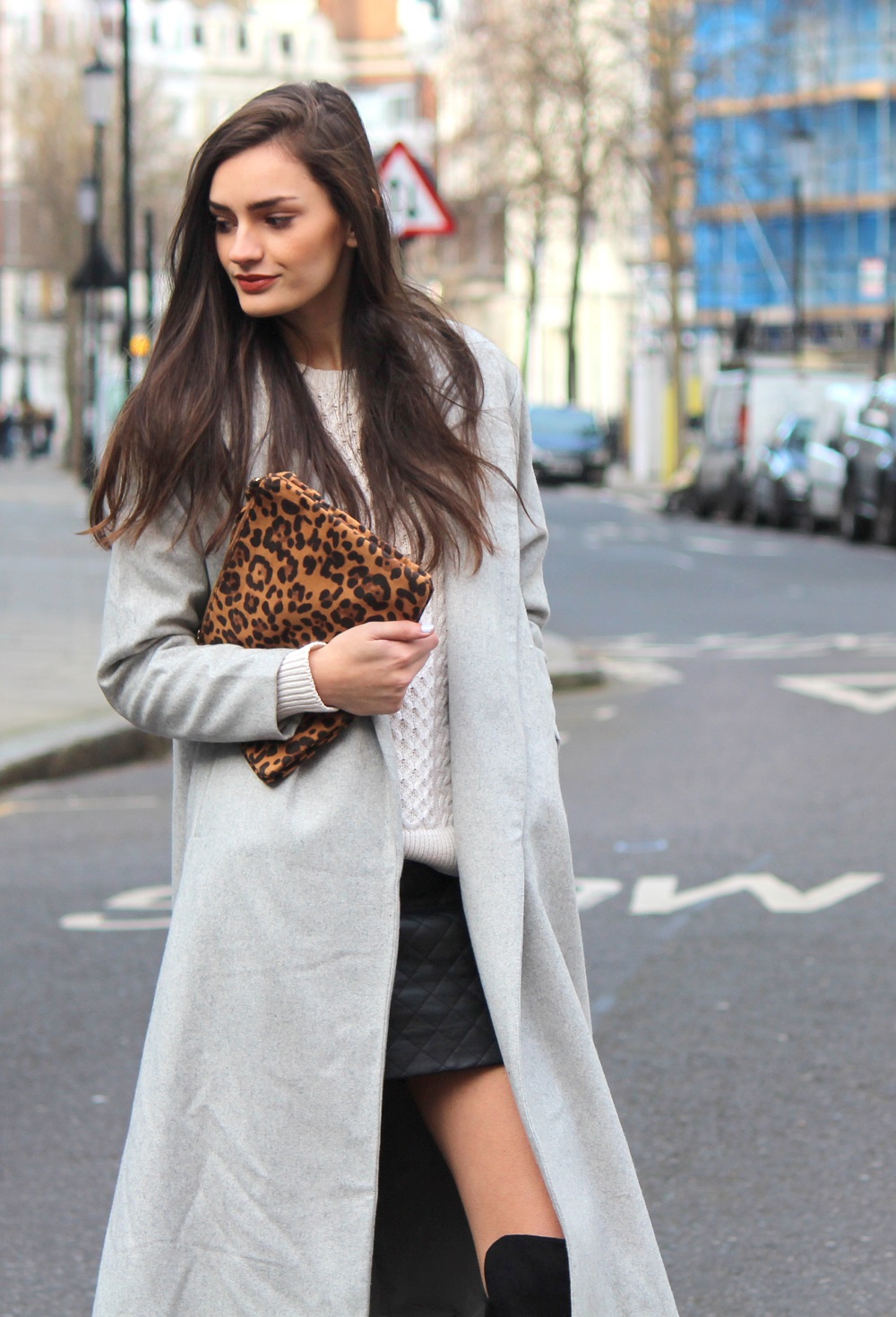 Peexo fashion blog spring outfit quilted leather skirt cable knit jumper maxi coat and leopard print clutch