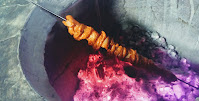 Roasting chicken pieces in charcoal Tandoor for butter chicken Murgh makhani recipe