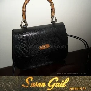 Queen Maxima carried Susan Gail bamboo handle handbag