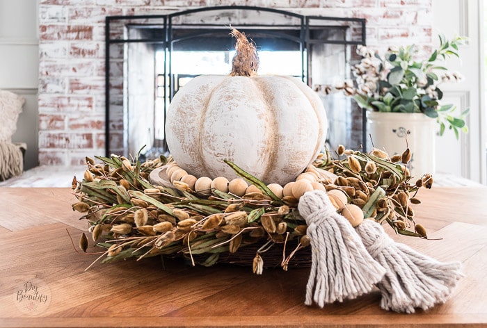 pumpkin and pussy willow wreath centerpiece