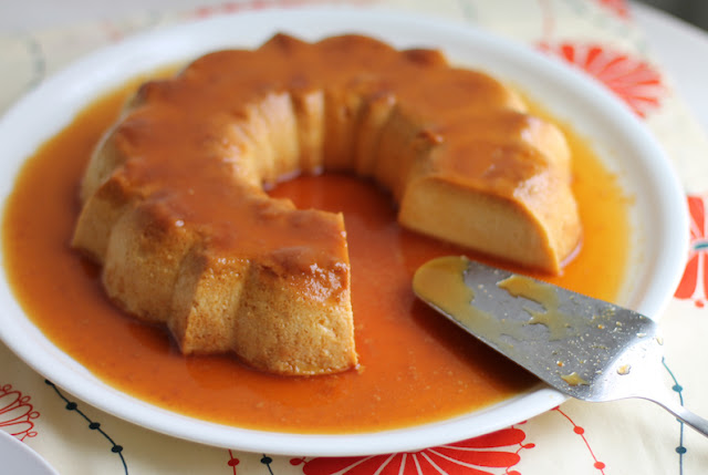 Food Lust People Love: Rich, flavorful caramel? Check. Soft, spoonable custard? Check. Sticky sweet baked sides? Check. This classic crème caramel ticks all the boxes and, since it’s baked in a Bundt pan, it’s pretty too. Perfect for a party. This recipe is adapted from one shared a couple of years ago by my fellow Bundt Baker, Felice from All That’s Left Are the Crumbs. It couldn’t be easier to make since the custard ingredients are blitzed together in a blender. The caramelized sugar is a little bit tricky but very manageable. I promise you the effort is worth it.