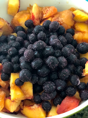 Blueberries and peaches for mini peach and blueberry crisps