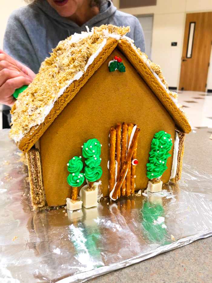 Scenes from a Gingerbread House Decorating Event + Secrets to Building a Gingerbread House that Won't Collapse