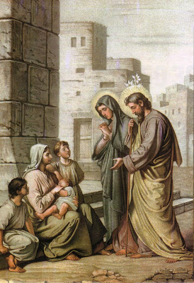 San José y la Vírgen María con familia pobres
