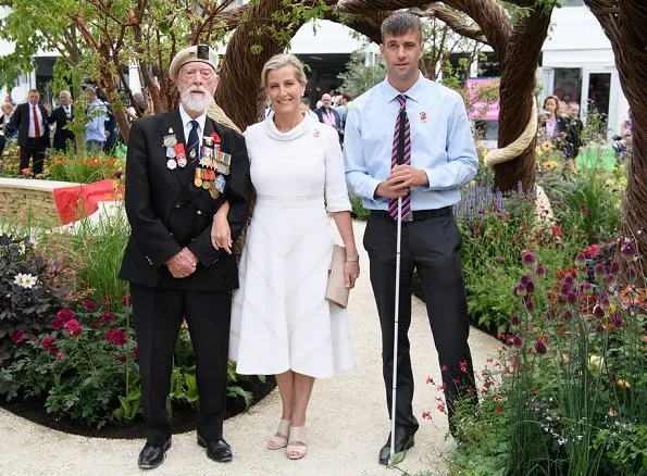 Countess Sophie wore SUZANNAH Wave Textured Stripe skirt and top, carried Sophie Habsburg- Amber clutch at the RHS Hampton Court Palace Flower Show
