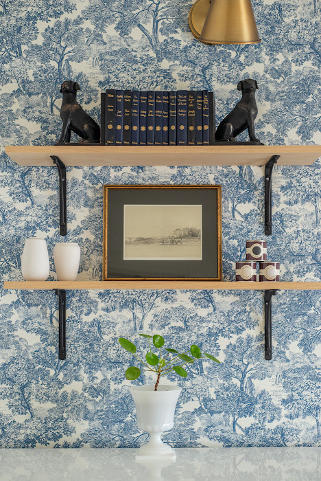 floating shelves in office, toile wallpaper, blue floral wallpaper