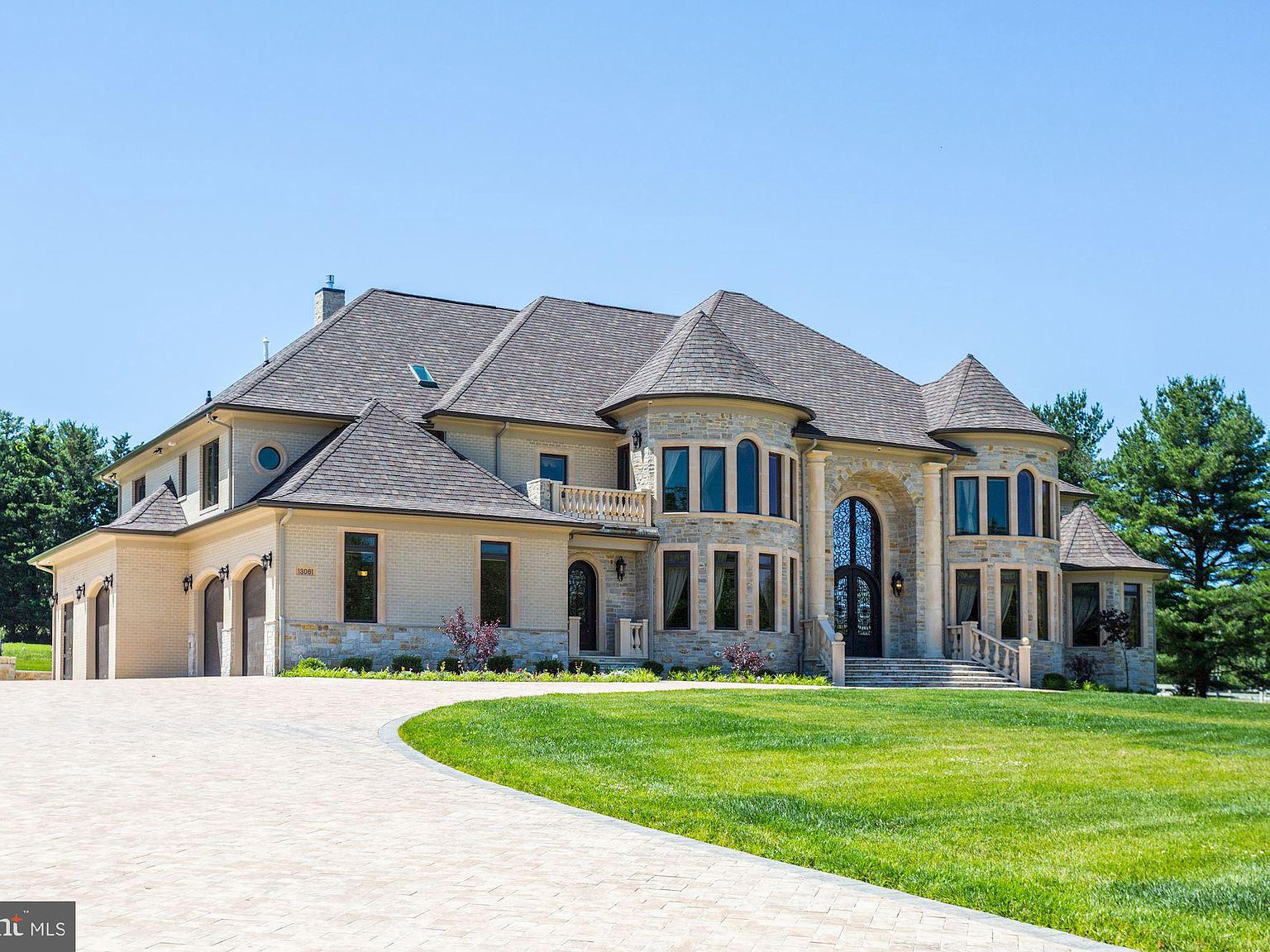 15,000 Square Foot ColonialStyle Stone and Brick Mansion In Highland