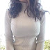 Busty sweater is hiding great mammaries! (gif)