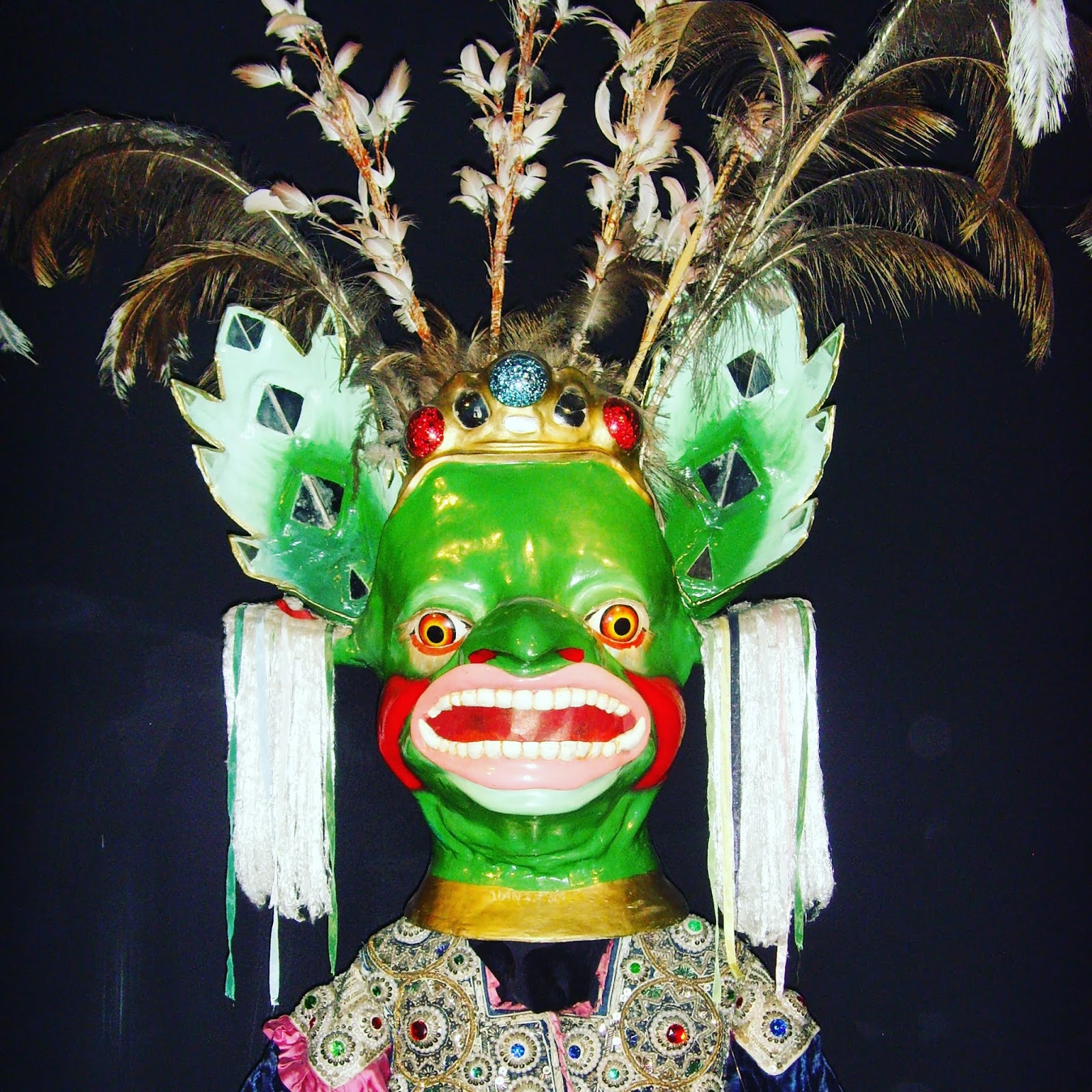 green and red big mouth mask la paz bolivia