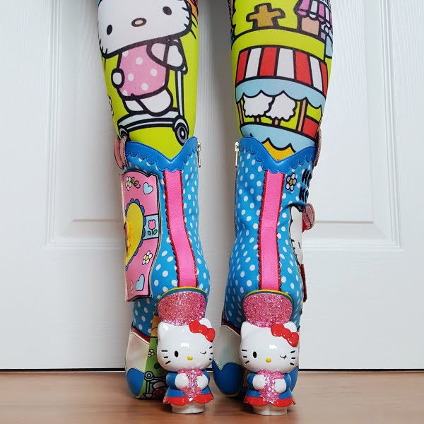 Hello Kitty character heeled boots being worn with bright Sanrio tights