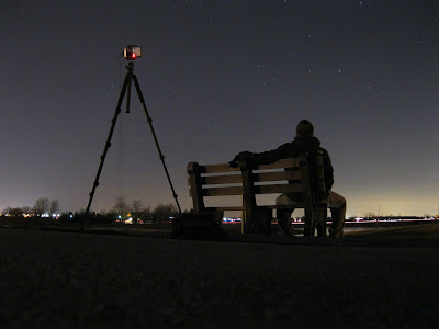 night photo sitting on a bench