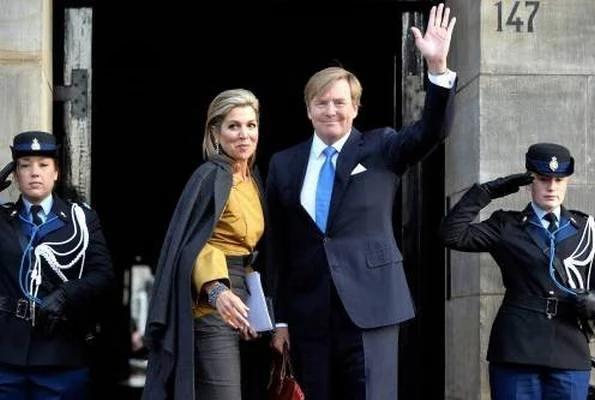 Princess Beatrix and Princess Margriet. Queen Maxima wore Natan top and skirt, Gianvito Rossi suede pumps, Travelteq work bag