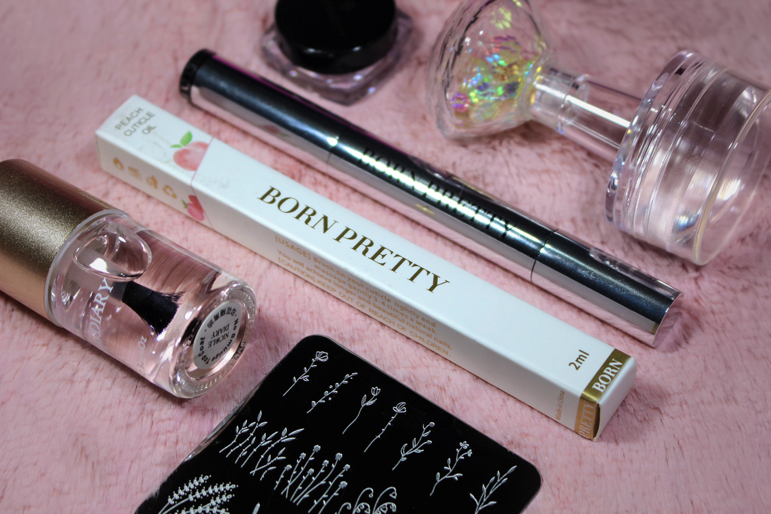 close-up of five different nail art, and nail care products by born pretty store