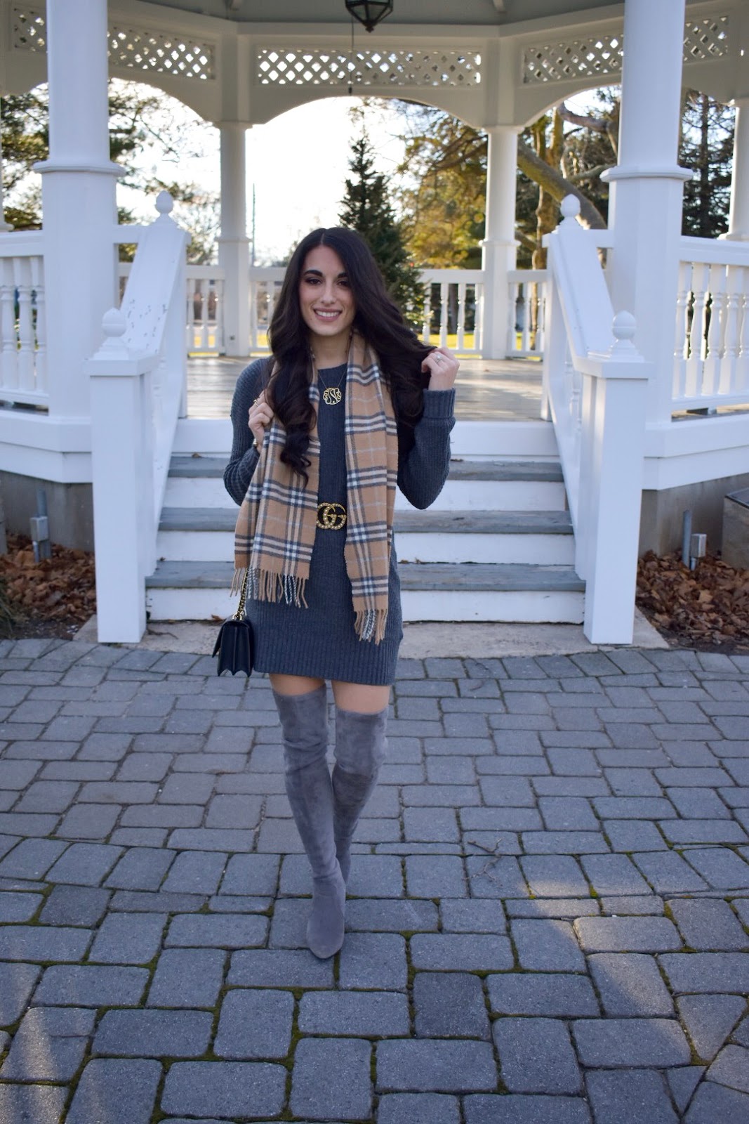 sweater dress and tall boots
