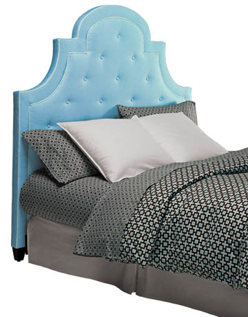 This modern version of the 60s padded tufted headboard is chic.