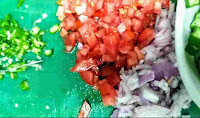 Chopped green chillies, tomato and onion for bhindi ki sabji bhindi fry recipe