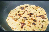 Roasting Methi paratha till light brown on pan or tawa for Methi paratha recipe