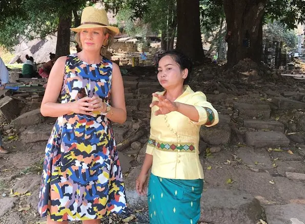 Queen Mathilde visited the Vat Phou temple south of Pakse. Queen Mathilde in a new colourfur print dress on the final day in Laos