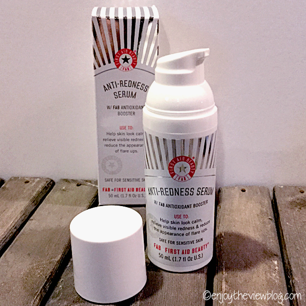 A bottle of First Aid Beauty Anti-Redness Serum without the lid.
