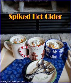 Spiked Hot Cider is a warm comforting drink for a cold day, a party or a holiday gathering. | Recipe developed by www.BakingInATornado.com | #recipe #drink