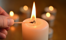 a candle being lit