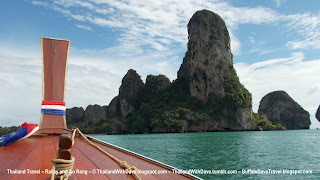 Longtail boat ride from Ao Nang to Railay - The bow of our longtail boat with cliffs in background