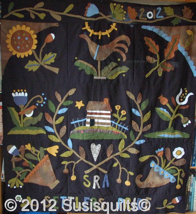 susis quilts settlers pride quilt with top and bottom border