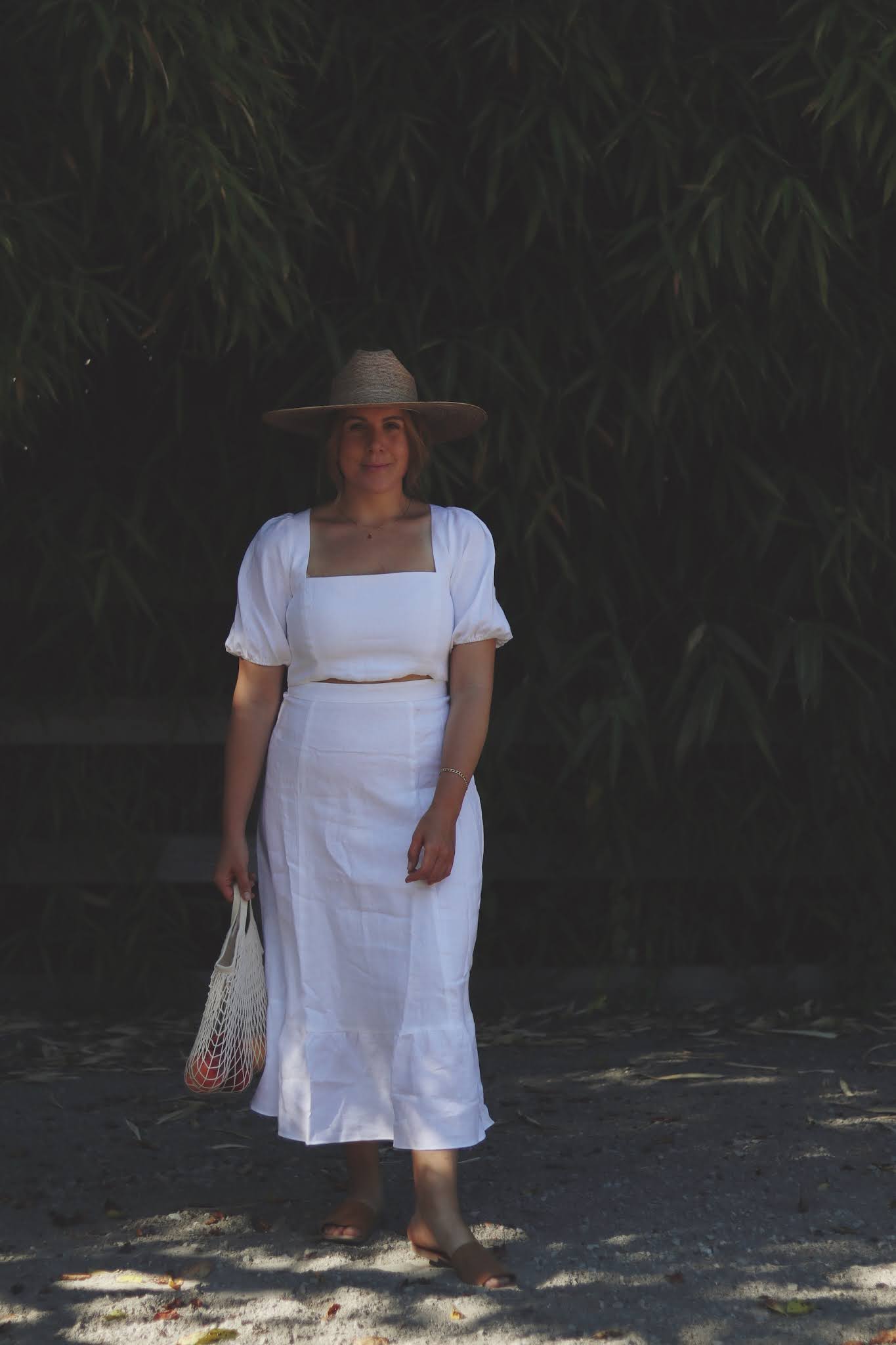 reformation linen two piece lack of color palm hat summer white outfit