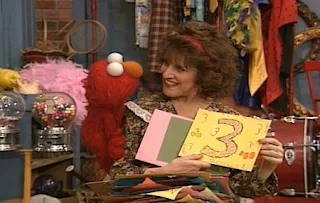 Ruthie asks some questions from pictures to Elmo and she wants to learn numbers in the picture. Sesame Street The Best of Elmo