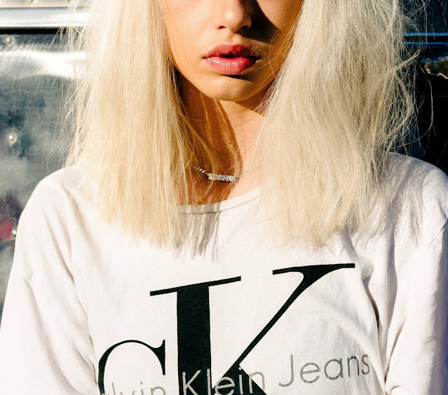 Girl wearing white t-shirt in 'how to style a white t-shirt in 9 different ways' in Fashion and lifetyle blog by Ritu Biswas