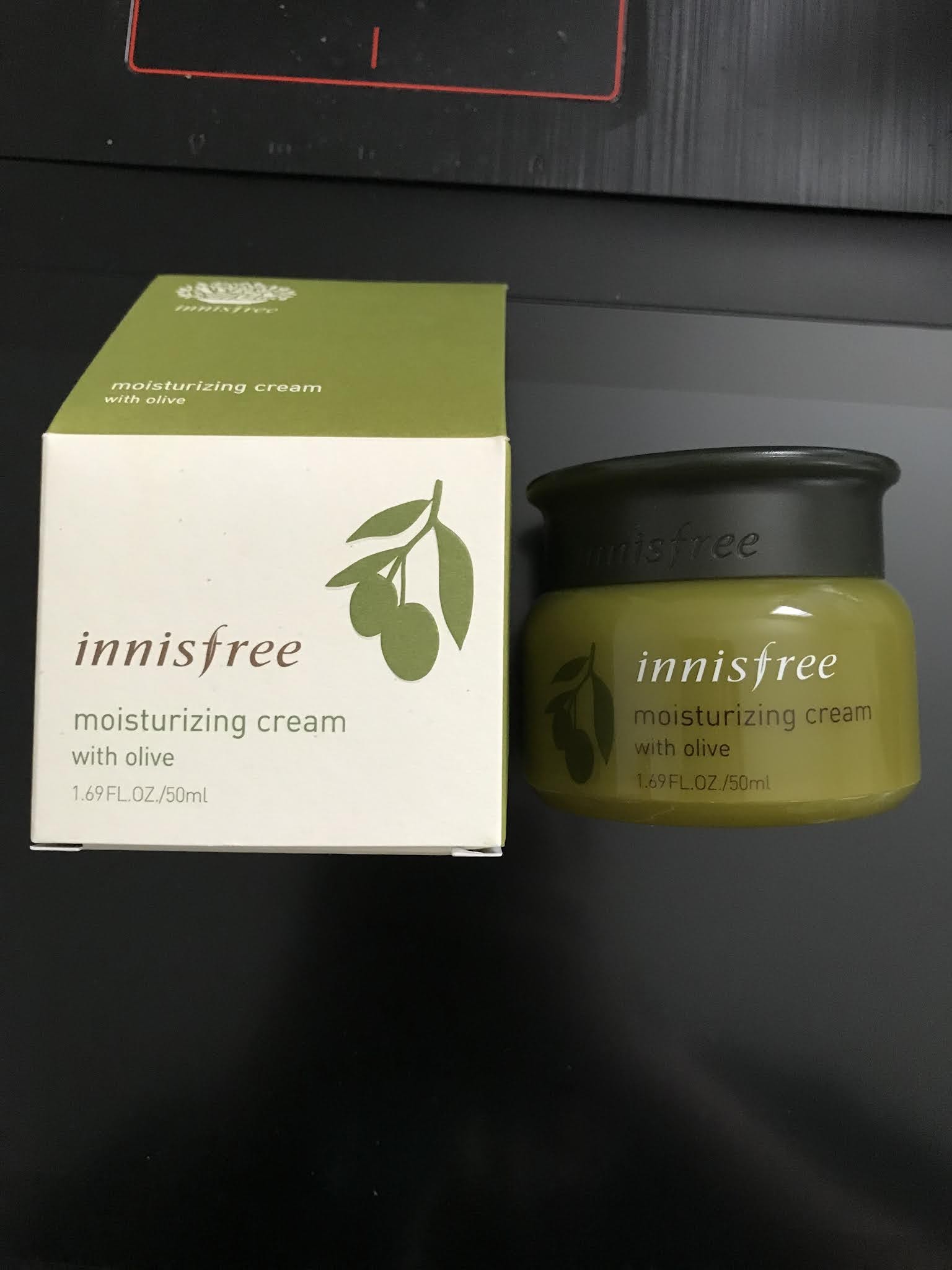 Innisfree Moisturizing Cream with Olive Up on the ladder