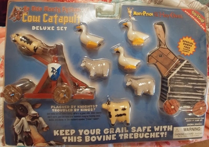 Herbie's World of Kitsch & Toys 🐄 Ye Olde Monty Python Cow Catapult Deluxe Set by Toy Vault 🐑