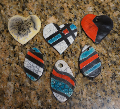 Raku pottery pendants - my first experiment with ceramic jewelry.