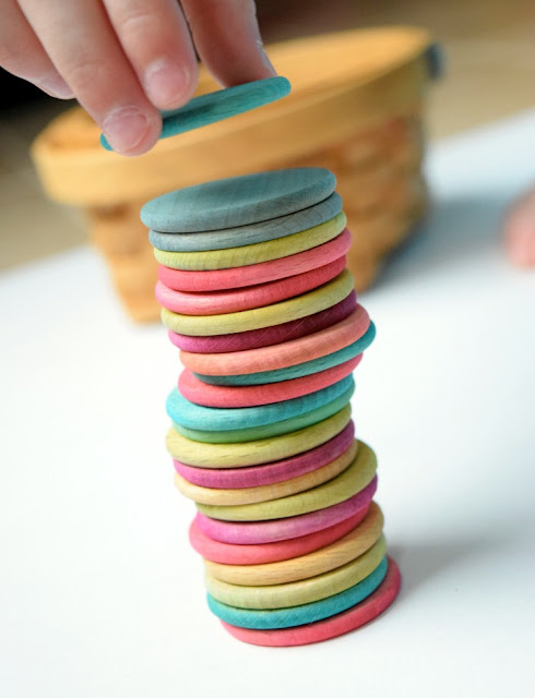 Dyed colored wooden discs for learning or playing Dyed colored wooden discs for learning or playing